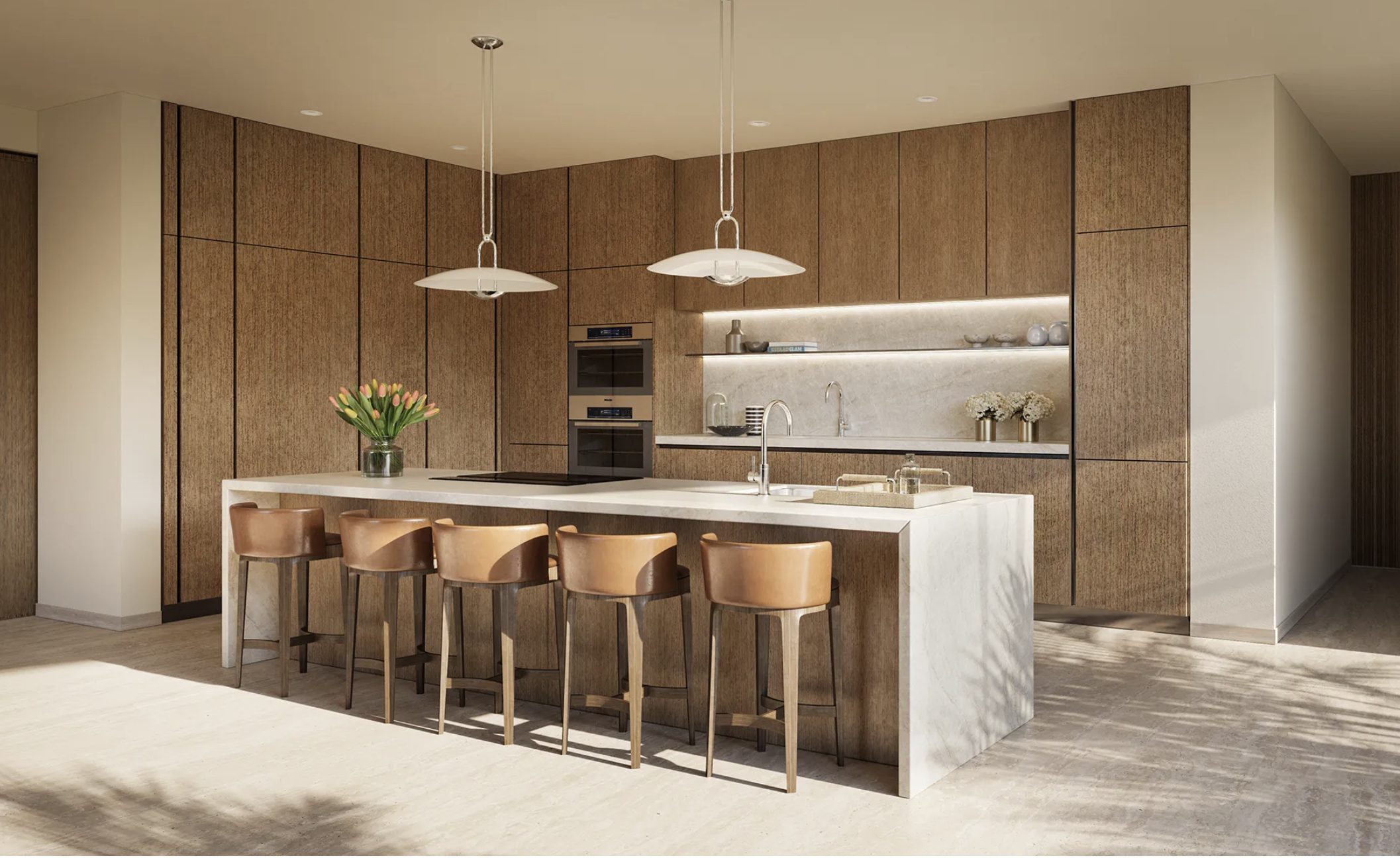 Four Seasons Private Residences Coconut Grove — kitchen with wood cabinetry and island seating