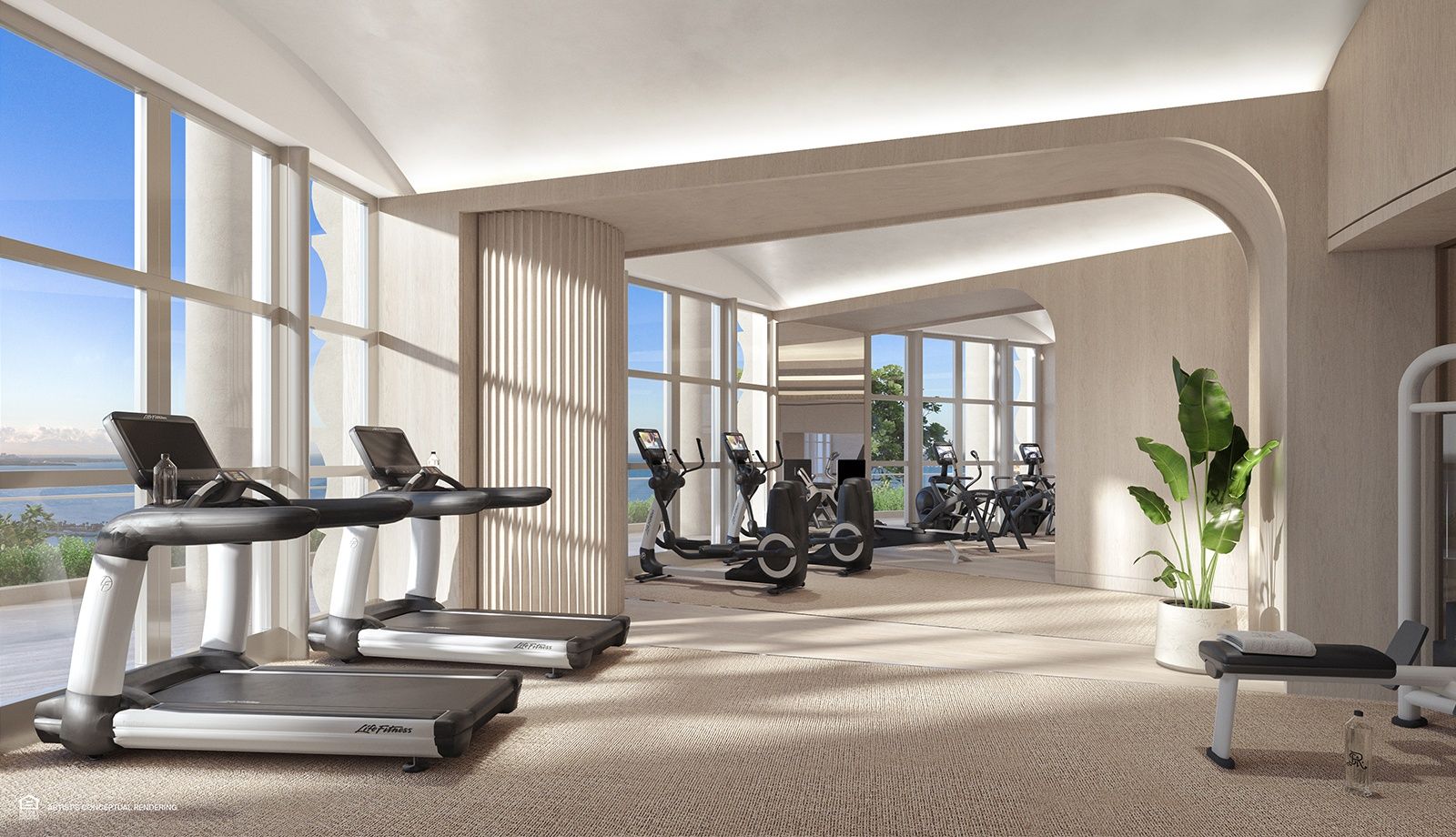 The St. Regis Residences, Miami — fitness center with bay views
